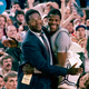 John Thompson with his first superstar, Patrick Ewing, after winning the 1984 national championship.